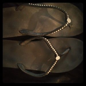 Black embellished platform flip flops